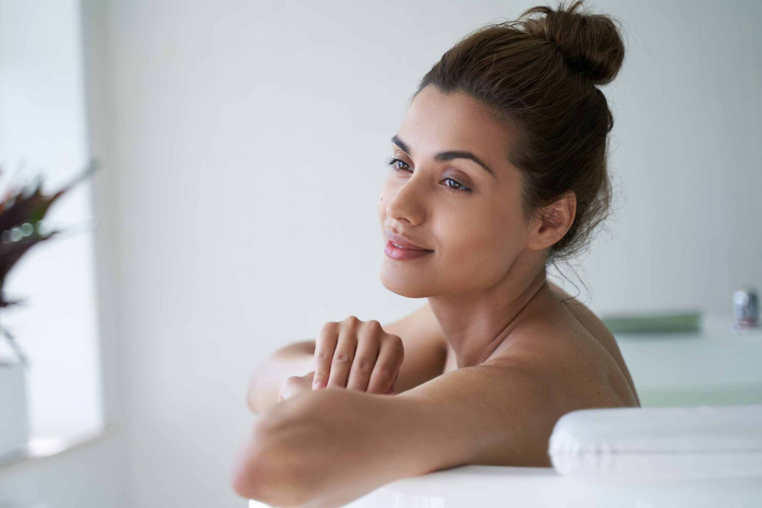 woman with defined facial contours and a natural jawline following a facial rejuvenation procedure.